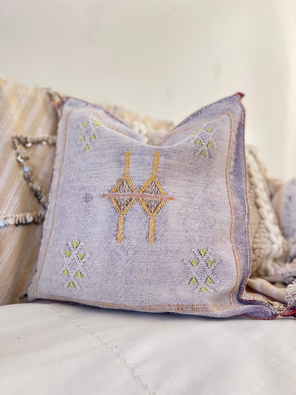 lavender coloured cactus silk cushion with multicoloured embroidery