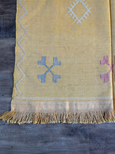 Load image into Gallery viewer, Yellow cactus silk rug with mutli coloured symbols woven into it
